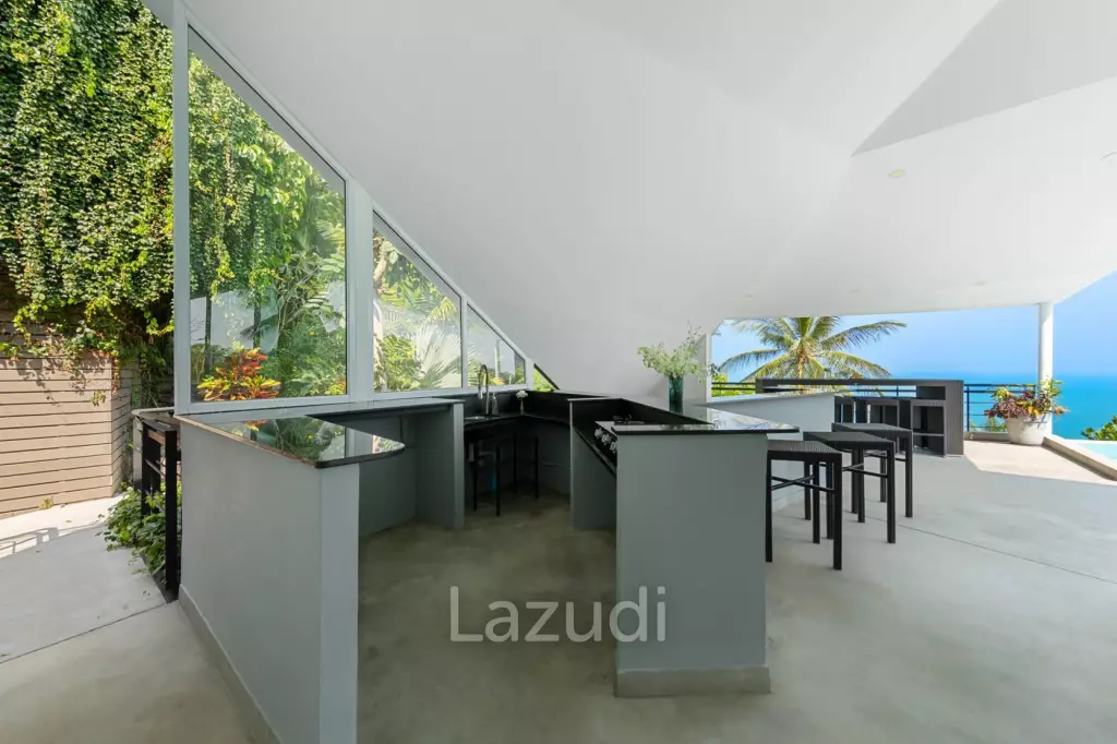 An Exquisite 11-Bedroom Hillside Villa with Ocean Views