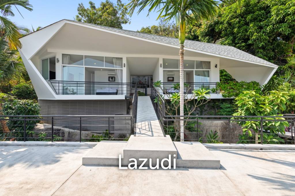 An Exquisite 11-Bedroom Hillside Villa with Ocean Views