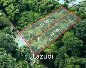 ENCHANTING RIVERFRONT PLOT IN TANAH LOT – A RARE SLICE OF TRANQUILITY