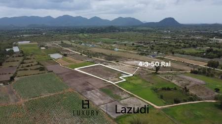 Expansive Agricultural Land 4-3-50 Rai in Cha Am