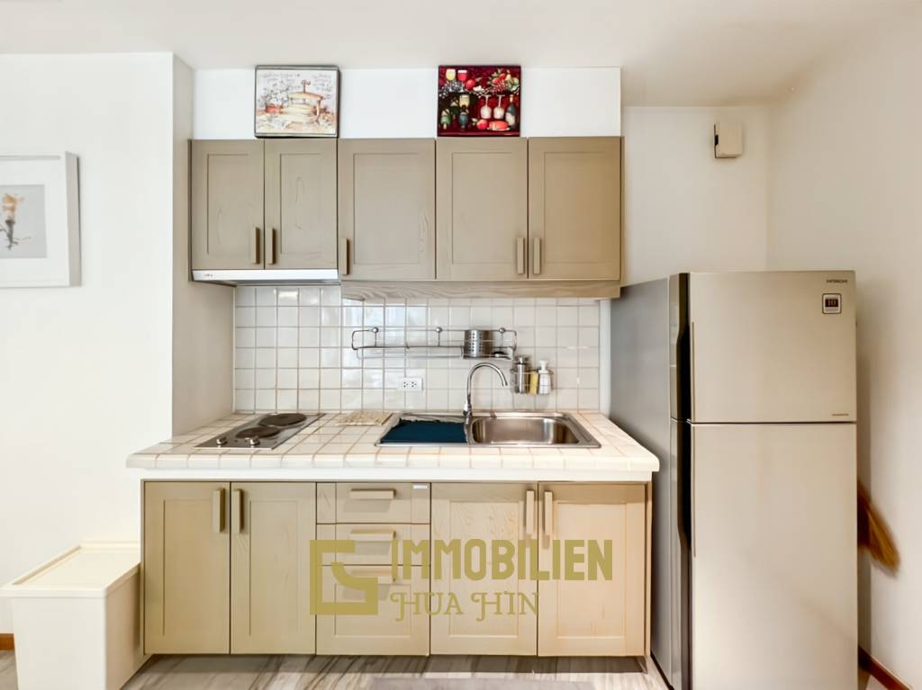 Baan Nub Kluen: Elégant condo d'une chambre à coucher avec accès à la plage