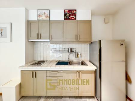 Baan Nub Kluen: Elégant condo d'une chambre à coucher avec accès à la plage