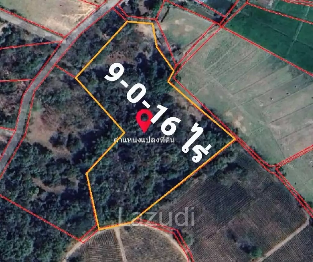 9 Rai Land For Sale on a hillside surrounded by trees.