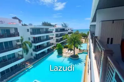 The Beach Palace: FOR SALE, Top Floor with Balcony