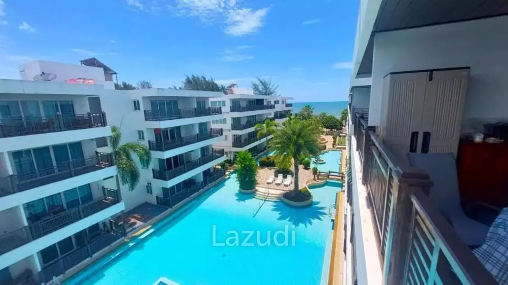 The Beach Palace: FOR SALE, Top Floor with Balcony