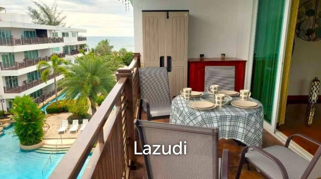 The Beach Palace: FOR SALE, Top Floor with Balcony