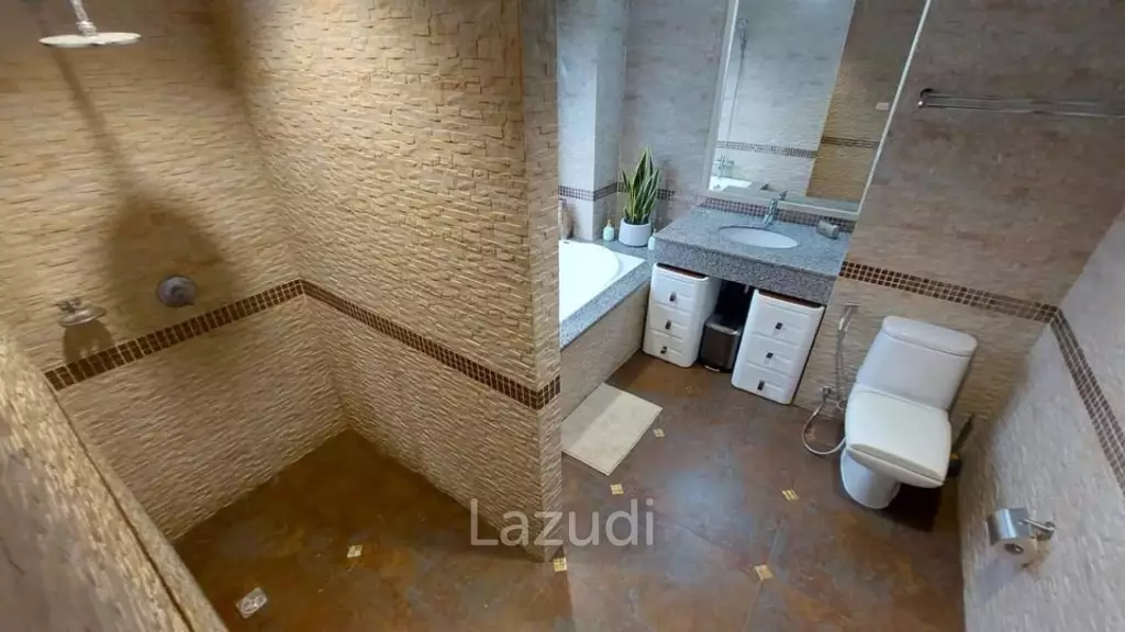 The Beach Palace: FOR SALE, Top Floor with Balcony