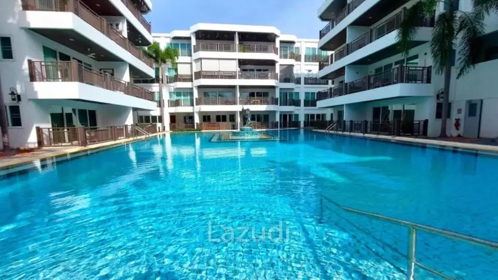 The Beach Palace: FOR SALE, Top Floor with Balcony