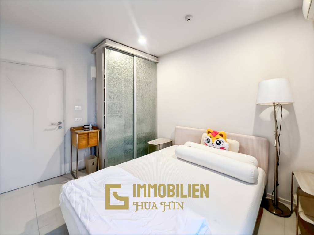 คอนโด 2 ห้องนอนริมสระว่ายน้ำที่ Baan Thew Talay Aqua Marine