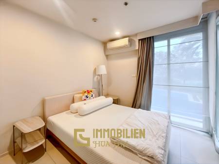 คอนโด 2 ห้องนอนริมสระว่ายน้ำที่ Baan Thew Talay Aqua Marine