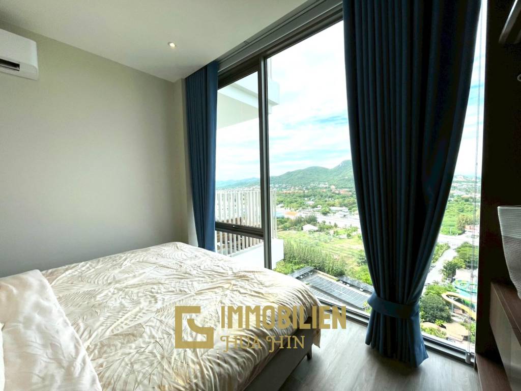 Vehha Condo: Luxuriöse 1 Schlafzimmer Eckeinheit mit Meer- und Bergblick