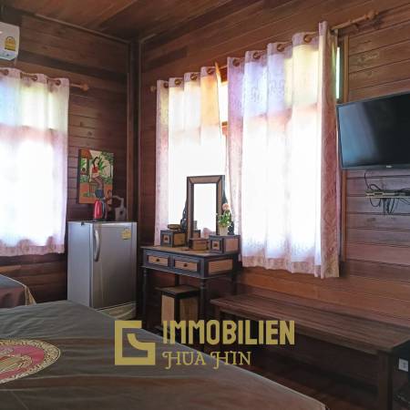 ชะอำ: รีสอร์ทสไตล์ไทย บ้านหลังใหญ่ 1 หลัง และบ้านหลังเล็ก 21 หลัง รวม 30 เตียง