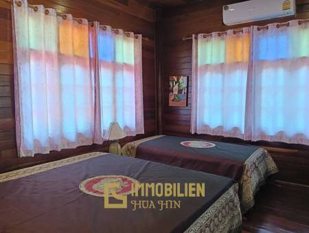 ชะอำ: รีสอร์ทสไตล์ไทย บ้านหลังใหญ่ 1 หลัง และบ้านหลังเล็ก 21 หลัง รวม 30 เตียง