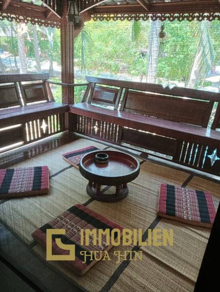 ชะอำ: รีสอร์ทสไตล์ไทย บ้านหลังใหญ่ 1 หลัง และบ้านหลังเล็ก 21 หลัง รวม 30 เตียง