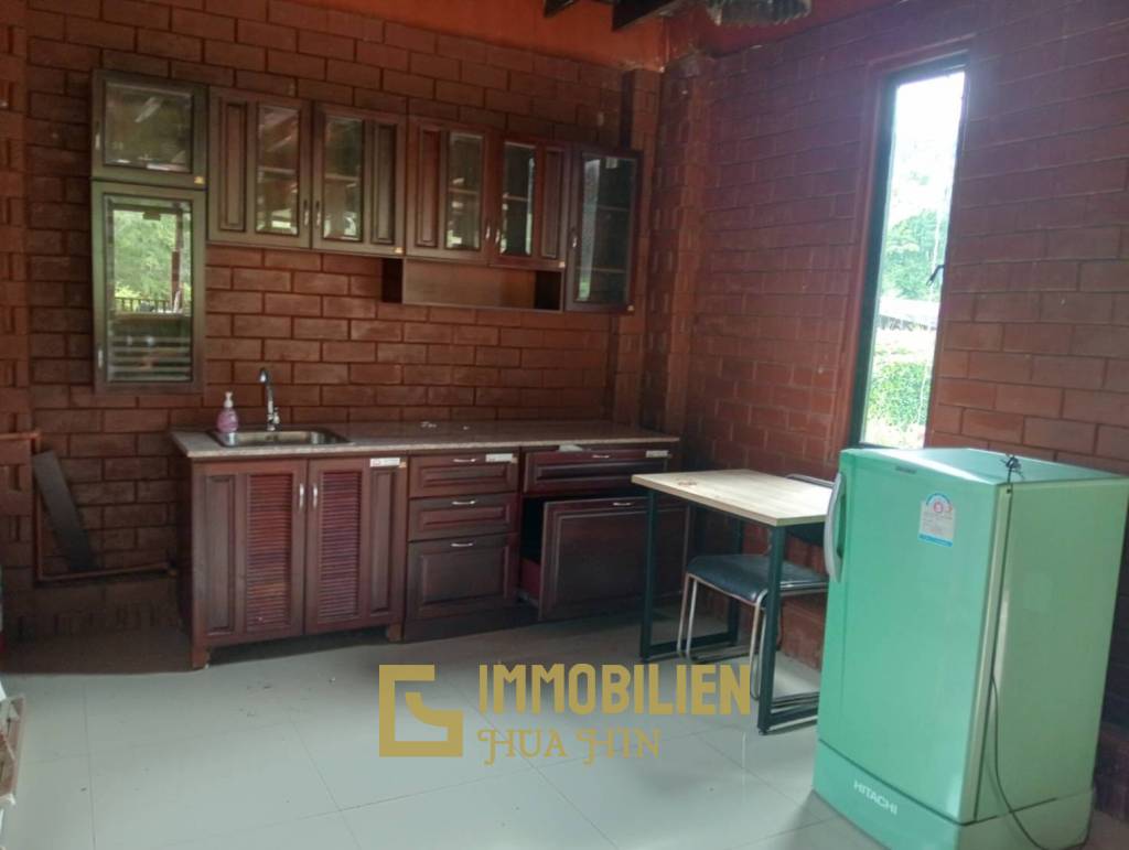 ชะอำ: รีสอร์ทสไตล์ไทย บ้านหลังใหญ่ 1 หลัง และบ้านหลังเล็ก 21 หลัง รวม 30 เตียง