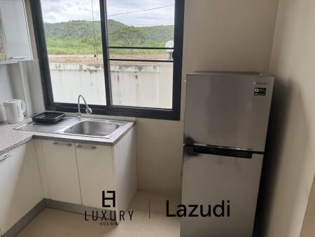 SOI 102: 3 Bedroom house, common pool, cover parking