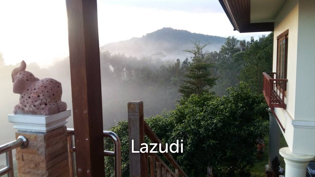 2 Bedrooms House on a Hillside with Mountain views.