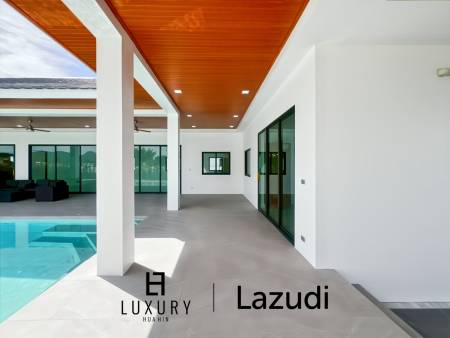 Piscine à débordement de 12 mètres / 4 chambres / terrain de 800 m²