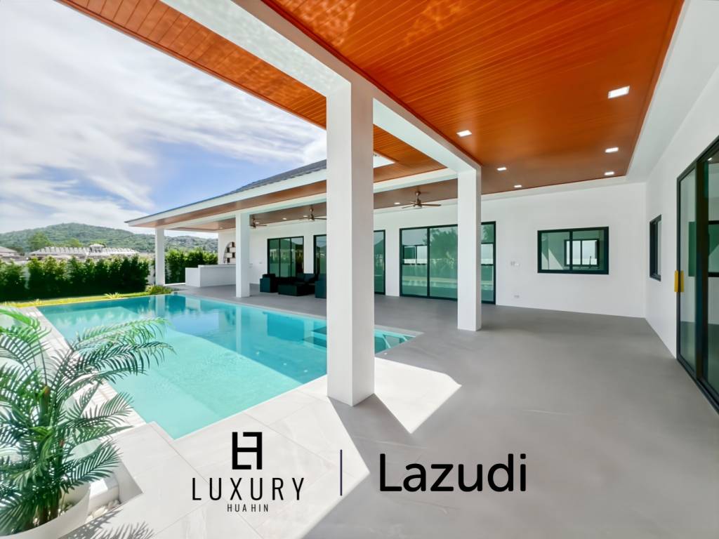 Piscine à débordement de 12 mètres / 4 chambres / terrain de 800 m²