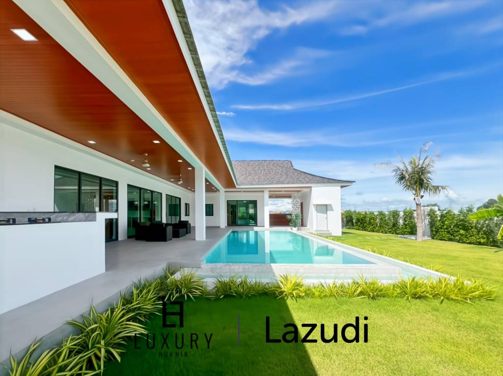 Piscine à débordement de 12 mètres / 4 chambres / terrain de 800 m²