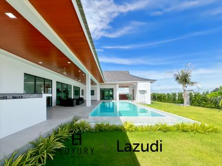 Piscine à débordement de 12 mètres / 4 chambres / terrain de 800 m²