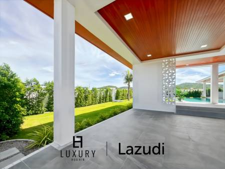 Piscine à débordement de 12 mètres / 4 chambres / terrain de 800 m²