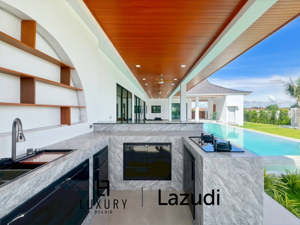 Piscine à débordement de 12 mètres / 4 chambres / terrain de 800 m²