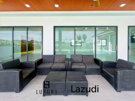 Piscine à débordement de 12 mètres / 4 chambres / terrain de 800 m²