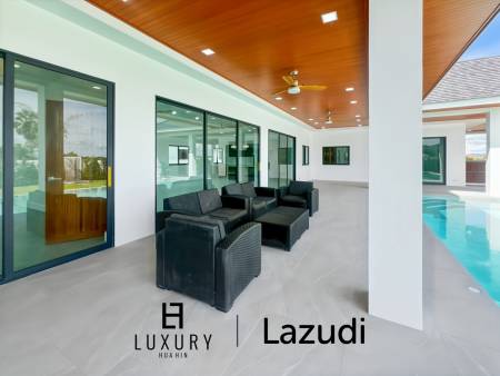 Piscine à débordement de 12 mètres / 4 chambres / terrain de 800 m²