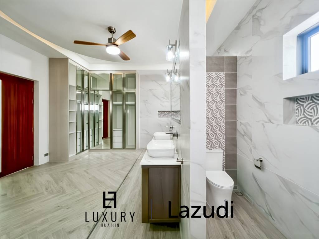 Piscine à débordement de 12 mètres / 4 chambres / terrain de 800 m²