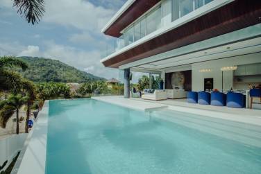 A stunning 4-bedroom luxury pool villa nestled in the peaceful Rawai area. A stunning 4-bedroom luxury pool villa nestled in the peaceful Rawai area.