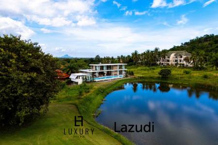 Située au bord d'un lac, à proximité d'un terrain de golf / Terrain de 1 600 m² / 6 chambres