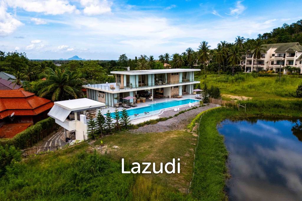Exclusive Waterfront Villa: 6-Bed Luxury at Palm Hills Golf Club