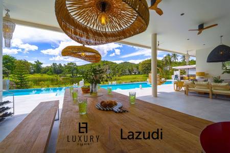 Située au bord d'un lac, à proximité d'un terrain de golf / Terrain de 1 600 m² / 6 chambres