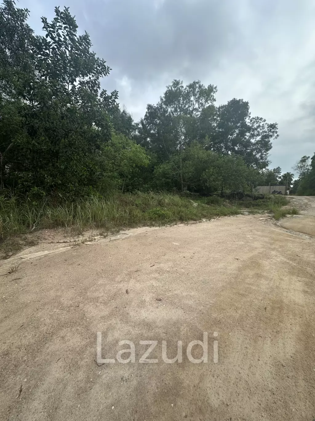 Land with  House and Great Potential Between Srithanu and Thongsala