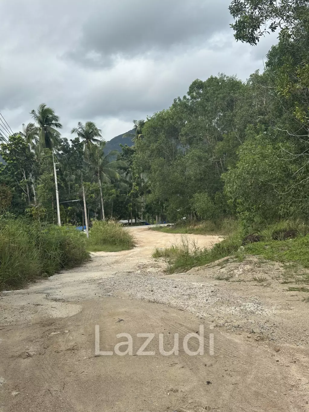 Land with  House and Great Potential Between Srithanu and Thongsala