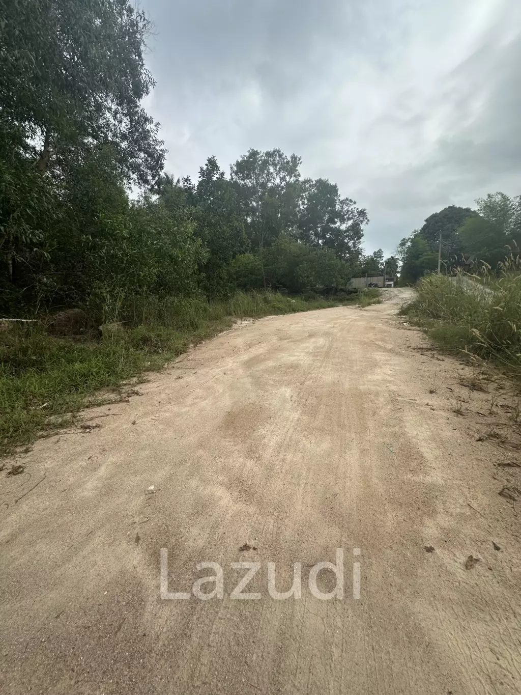 Land with  House and Great Potential Between Srithanu and Thongsala