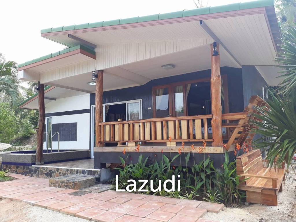 Land with  House and Great Potential Between Srithanu and Thongsala