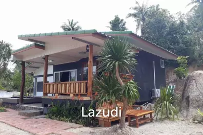 Land with  House and Great Potential Between Srithanu and Thongsala