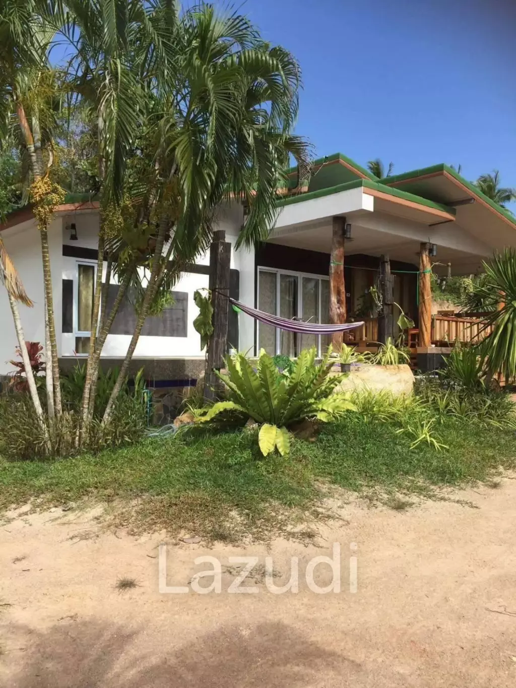 Land with  House and Great Potential Between Srithanu and Thongsala