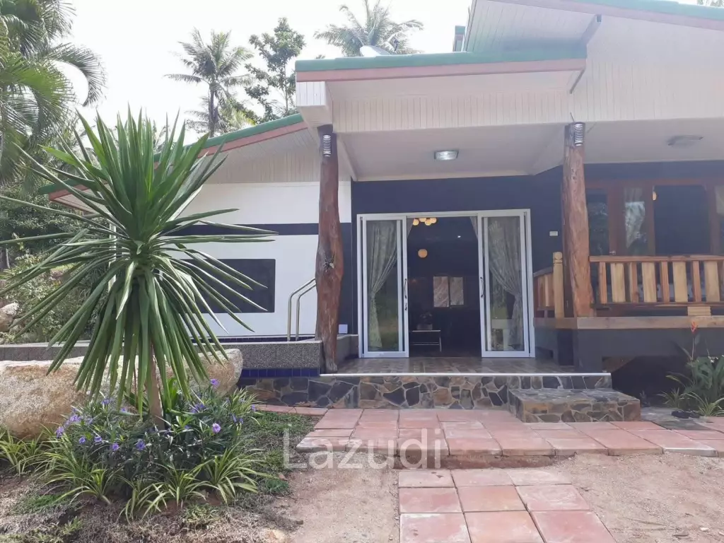 Land with  House and Great Potential Between Srithanu and Thongsala