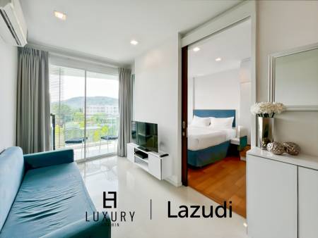 Modern 1-Bed Condo on Top Floor in Baan View Viman