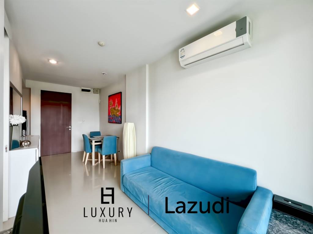 Modern 1-Bed Condo on Top Floor in Baan View Viman