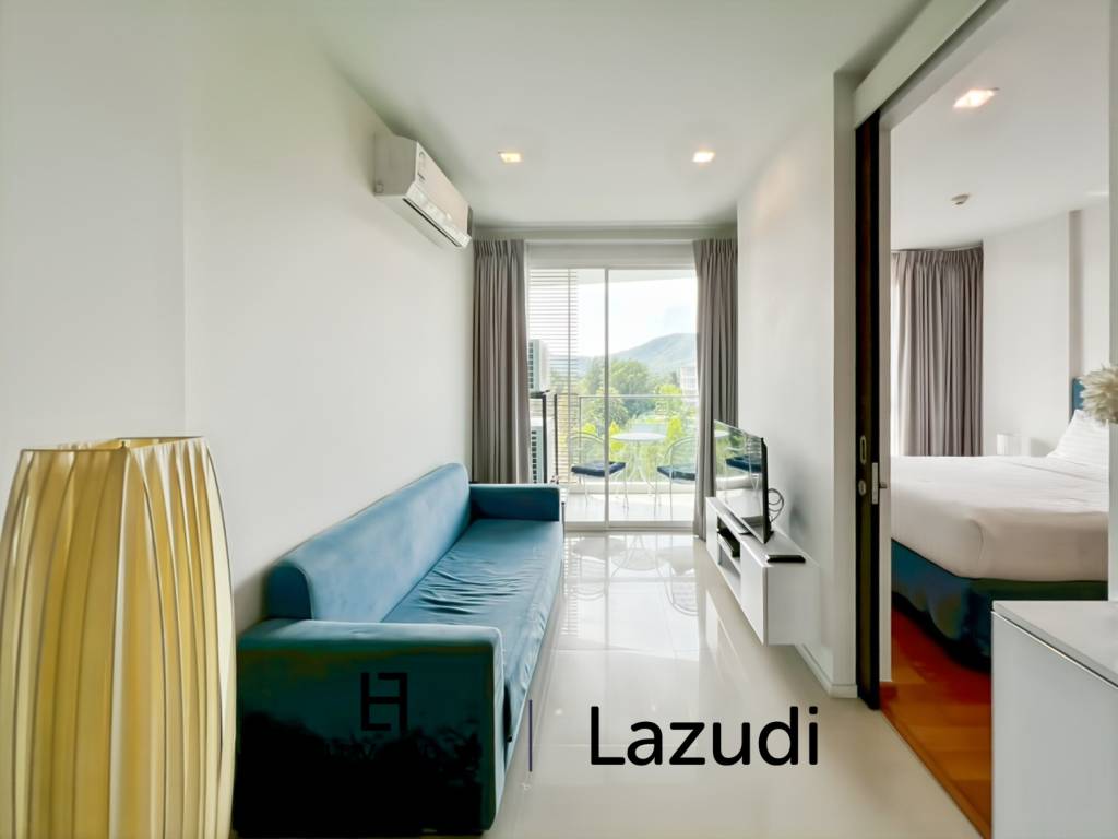 Modern 1-Bed Condo on Top Floor in Baan View Viman
