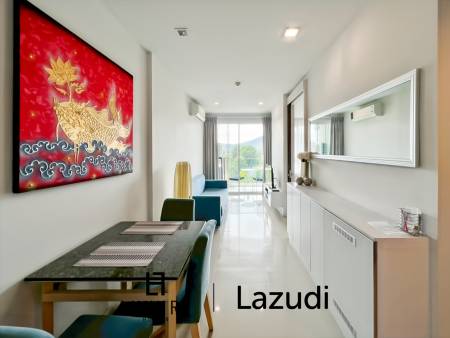Modern 1-Bed Condo on Top Floor in Baan View Viman