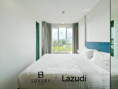 Modern 1-Bed Condo on Top Floor in Baan View Viman