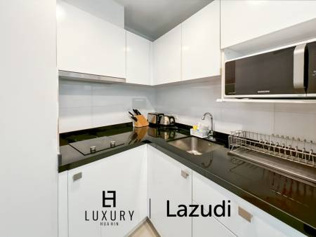 Modern 1-Bed Condo on Top Floor in Baan View Viman