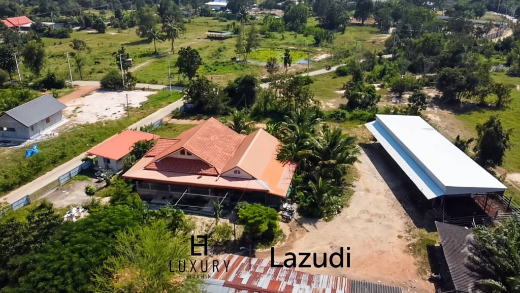 Maison individuelle / terrain de 5000 m² / plusieurs bâtiments