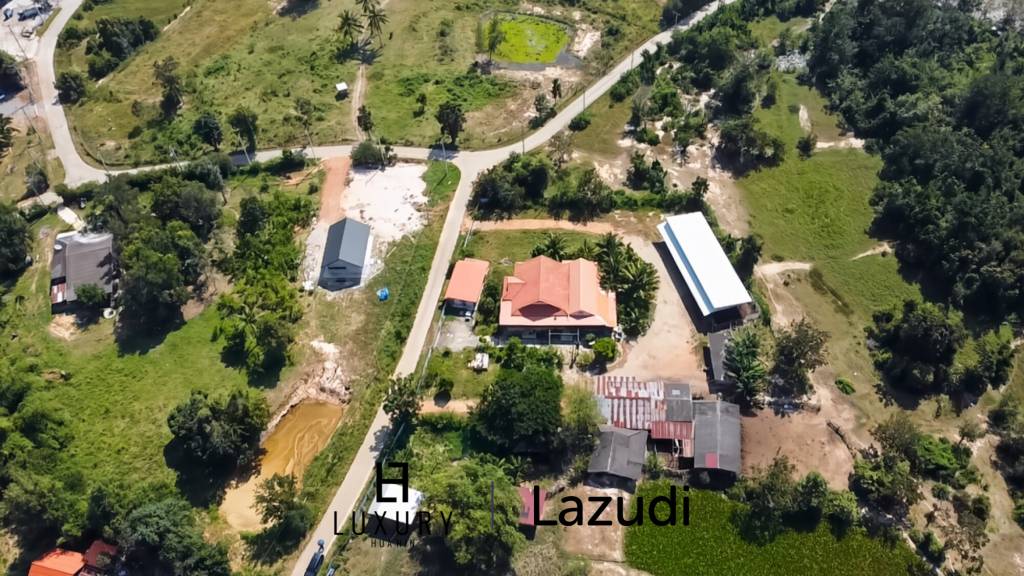 Maison individuelle / terrain de 5000 m² / plusieurs bâtiments