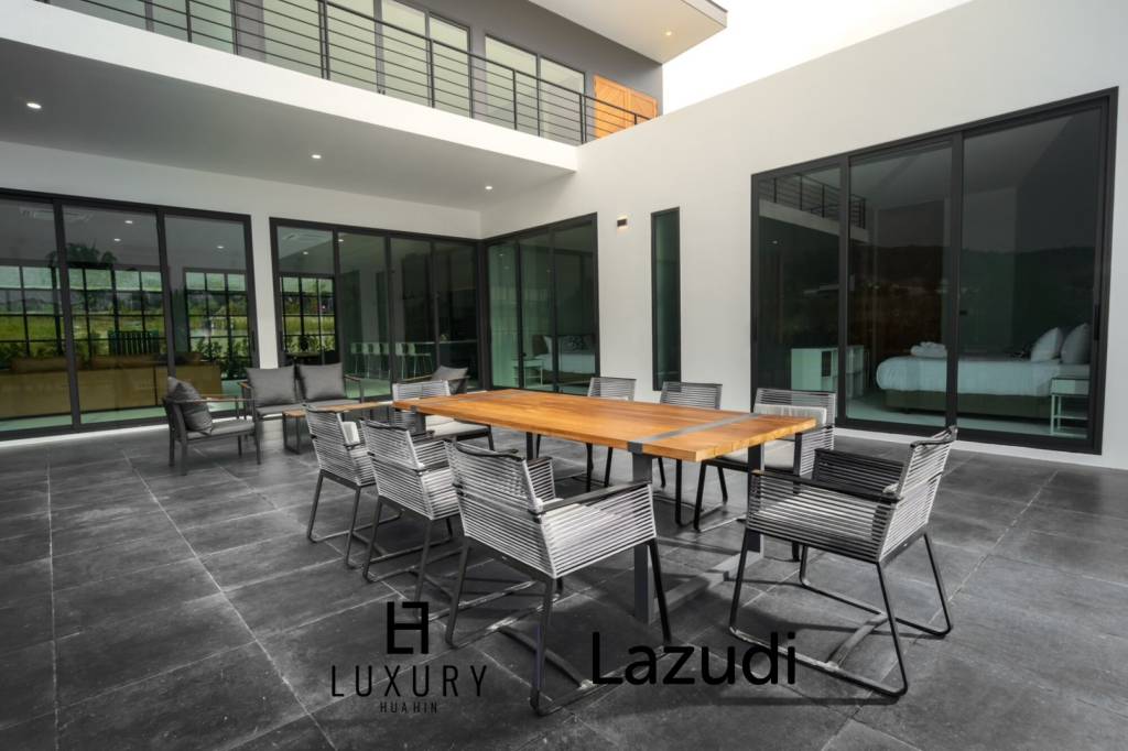 Одноэтажная современная вилла с 5 спальнями и бассейном в районе Фу Монтра К-Хаад сдается в аренду.